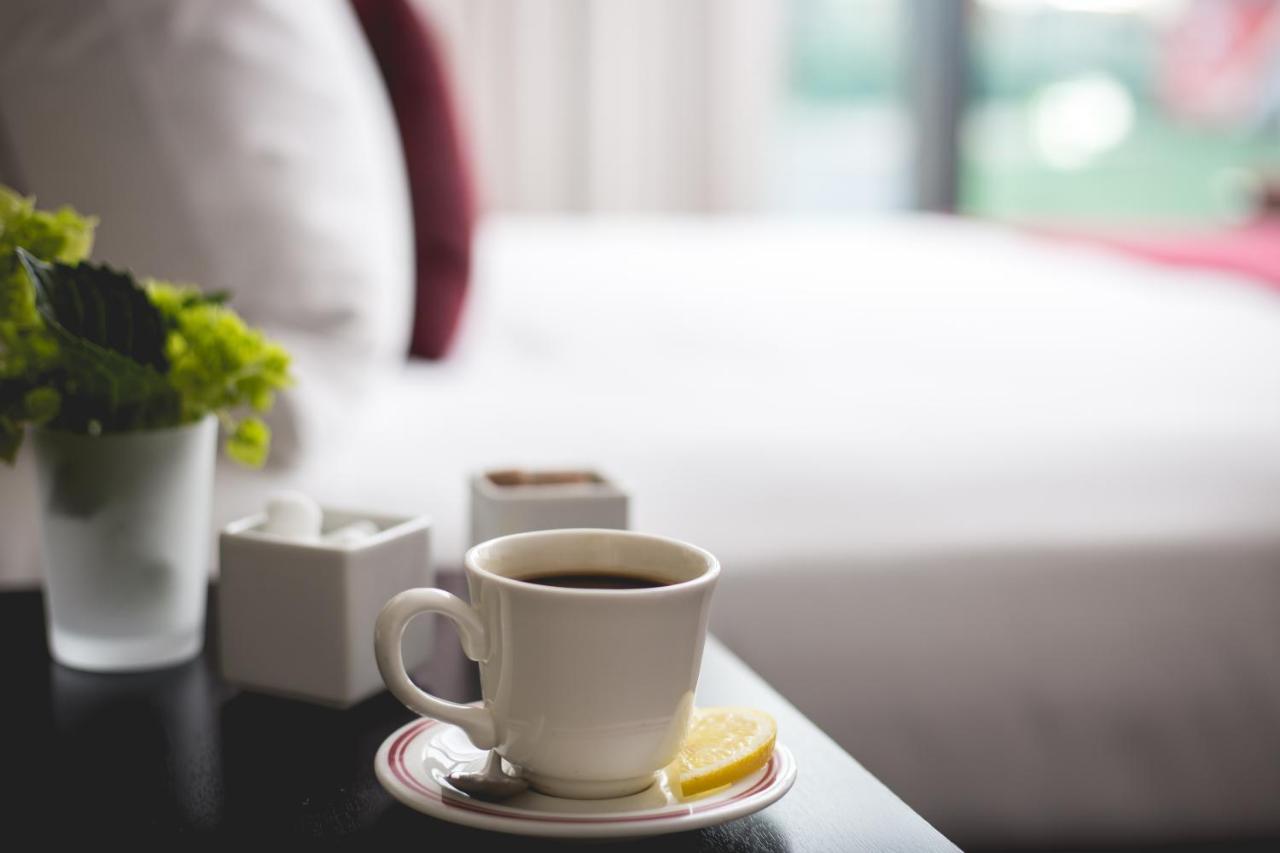 Hotel Commonwealth Boston Extérieur photo A cup of coffee
